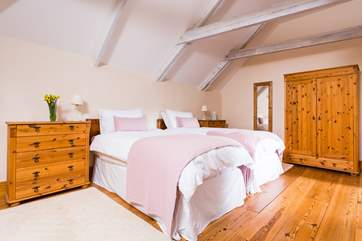 Bedroom 1, the spacious 'zip and link' bedroom with the beds made up as twin beds which can also be a 6' super-king size double.