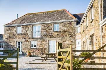 The rear of Wallis Barn faces onto the shared courtyard.