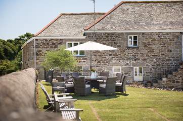 Enjoy a relaxing meal in the large garden.