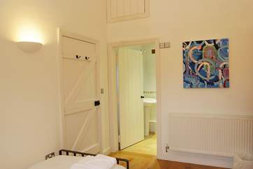 The twin bedroom has an en suite bathroom.