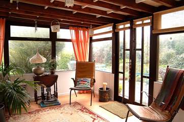 The sun-room leads out to the sunny patio.
