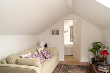 The upstairs sitting-room leads through to an en suite 'zip and link' (twin or double) bedroom.
