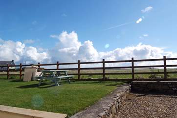 The garden has views across open countryside.
