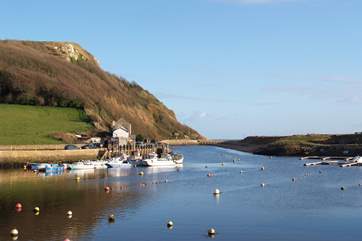 Seaton has a pretty harbour as well as the long pebbled beach.