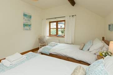There is plenty of space in the bedroom.