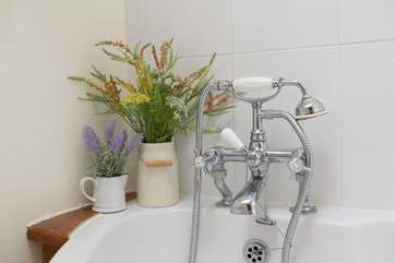 The bath has a useful shower attachment - there are two other showers in the property too of course.
