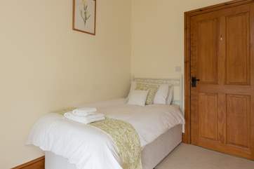 This pretty single bedroom is also on the first floor.