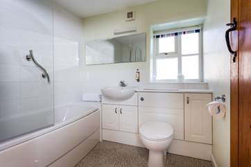 The bathroom is down the corridor between the bedrooms and living-room.