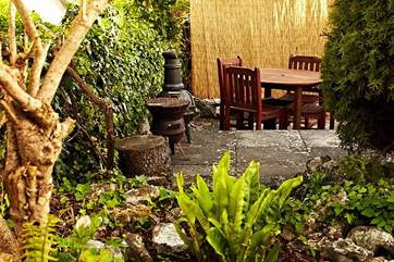 A lovely little spot for al fresco dining in this sun-trap.