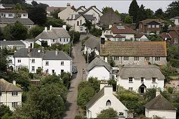 Holcombe village. The cottage is on the left halfway up the hill (with cars parked outside).