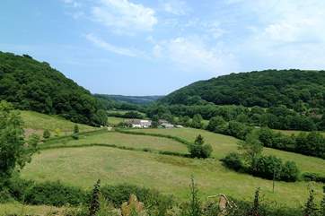 A distant view down the valley towards the farmstead.