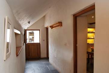 The large entrance hall is ideal for storing coats and boots - and for drying off a muddy dog!