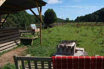 This is the outside BBQ and covered bar-area for you to enjoy. This area is just 100 yds from the cottage across a little field.