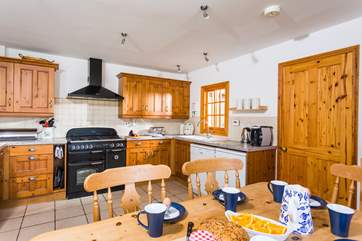 The spacious kitchen/dining-area of the cottage.