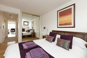 Couples will be so comfortable here as the bedroom has a king-sized bed and plenty of storage space.