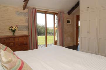 The large bedroom is very light.