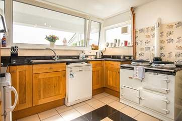 Cooking on the Aga will be a real delight but there is also a separate oven and hob.
