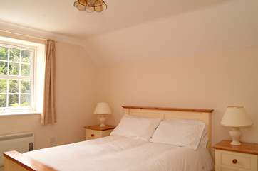 Bedroom 1 has a double bed and en suite shower-room.