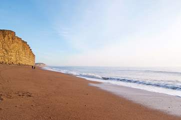 The dramatic cliffs and beach at West Bay, filming location for Broadchurch.