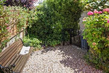 A little gate separates the parking area and garage to keep little ones safe.