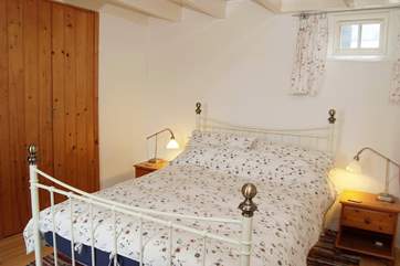 The master bedroom on the ground floor (Bedroom 1) .