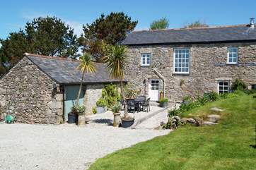 Little Trebarvah's south-facing garden is a peaceful spot from which to admire the countryside views.