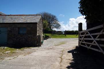 You can shut the gate to enclose the garden and parking areas.