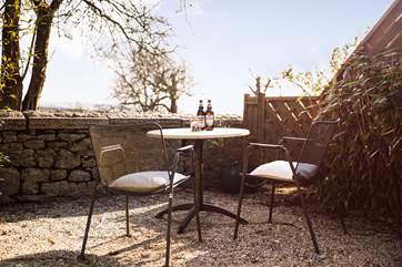 The terrace offers a little space for relaxing either with a good book or a bottle for two, you can find it through the little gate on the right next to the garden for Pebble Cottage.