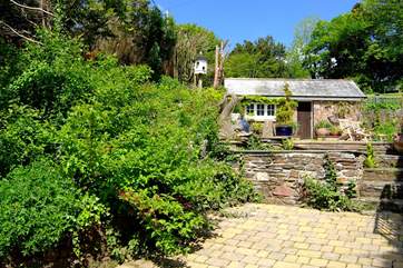 Even the garden shed on one side of the courtyard is a lovely old building.