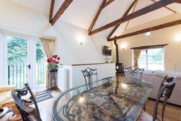 The open plan living-room is delightful.