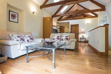 Gorgeous old beams, oak floors and bespoke oak joinery show the superb quality of this delightful cottage.