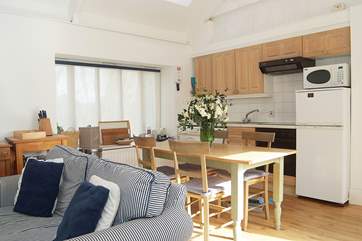 The kitchen and dining areas.