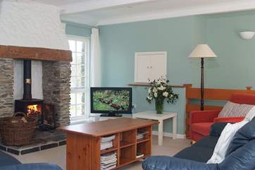The sitting-room has a wood-burner.