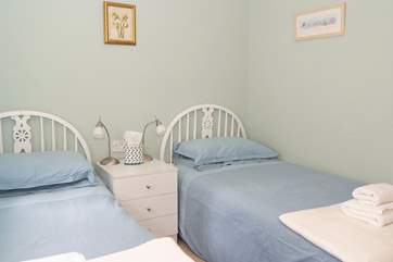 Bedroom 2 has 3' twin beds.