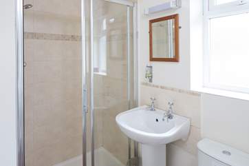 The en suite shower-room for Bedroom 1 has access from the utility-area too.
