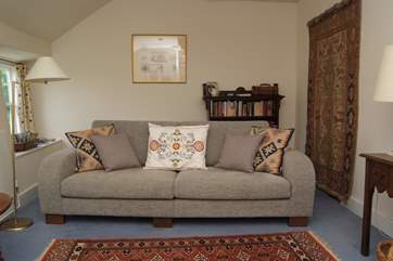 Snuggle up on the comfortable sofa.
