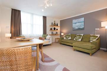 There is a dining-area in the sitting-room.