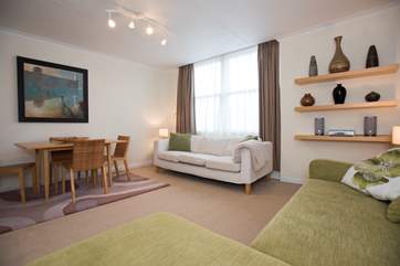 The spacious sitting/dining-room.