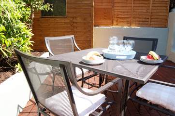 ... and just outside there is a really sunny decked-area where you can enjoy your breakfast, gin and tonic or whatever you fancy! You are on holiday!