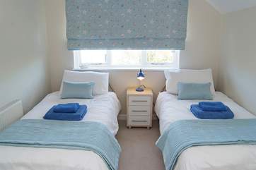 The twin bedroom is lovely and fresh, ideal for young children or a couple.