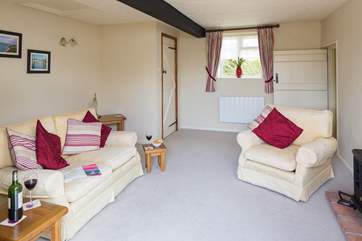 The sitting-room is light and airy.