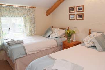 The twin bedroom is very pretty and also looks out over the garden.