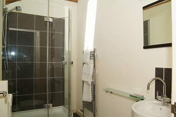 The contemporary shower-room with large shower cubicle.