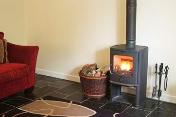 The contemporary wood-burner will keep you warm whatever the weather.