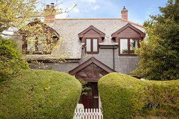 The front of the cottage is deceptive...the cottage is much more spacious than it looks from the access lane!