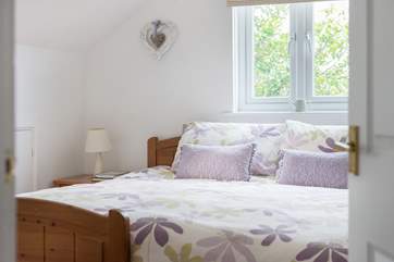 Bedroom 2 has 'zip and link' (3' twins or 6' double) beds seen made up as a double in the picture.