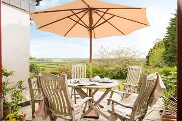 Enjoy meals outside while taking in the wonderful view.