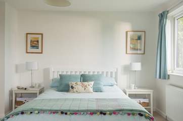 A king-size (5') bed in Bedroom 1.