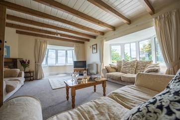 The huge sitting-room has gorgeous sea views.