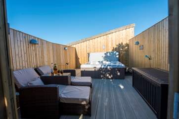 Your private decked area complete with a hot tub.